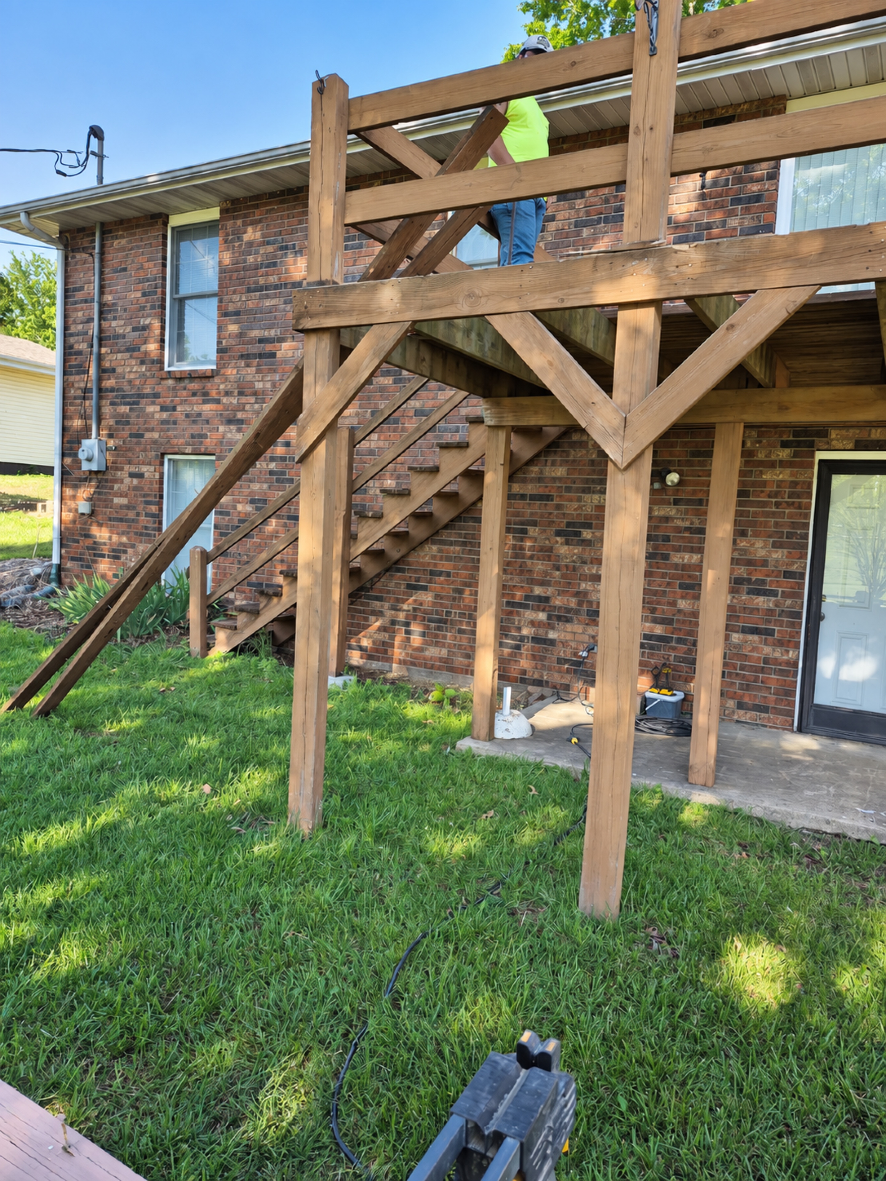 Side view of the existing elevated deck and stairs