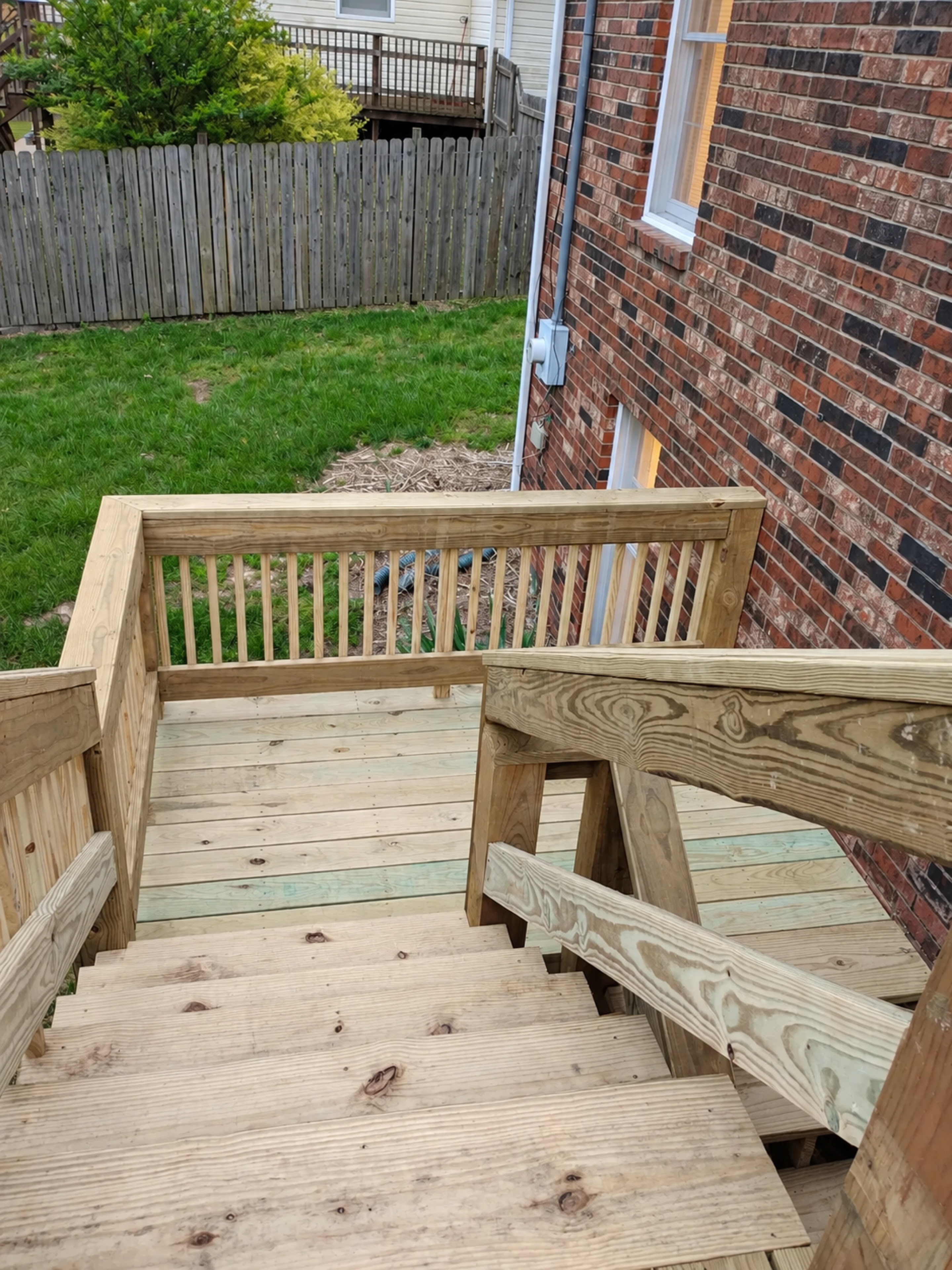 Alternate view down the new exterior stairs toward the landing