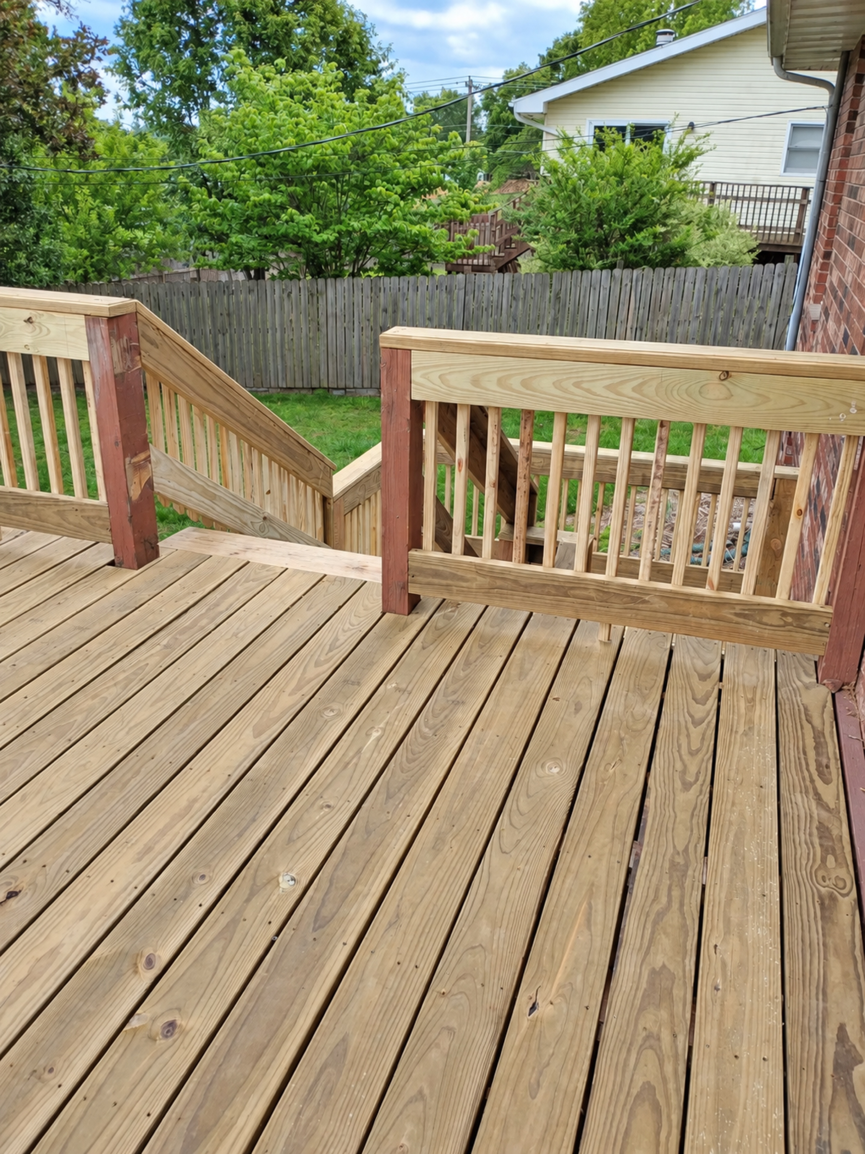 Alternate view across the completed upper deck toward the stairs